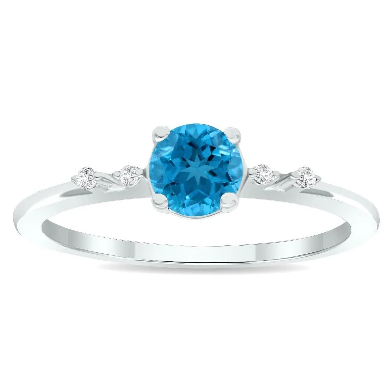 Women's Blue Topaz and Diamond Sparkle Ring in 10K White Gold