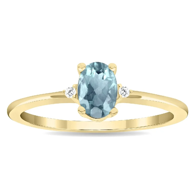 Women's Oval Shaped Aquamarine and Diamond Classic Band in 10K Yellow Gold