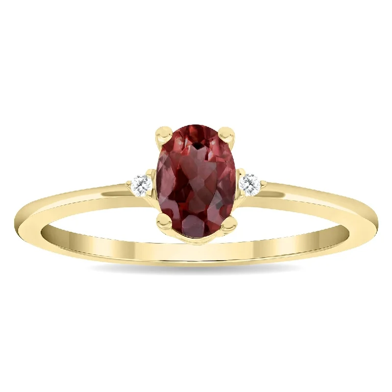 Women's Oval Shaped Garnet and Diamond Classic Band in 10K Yellow Gold