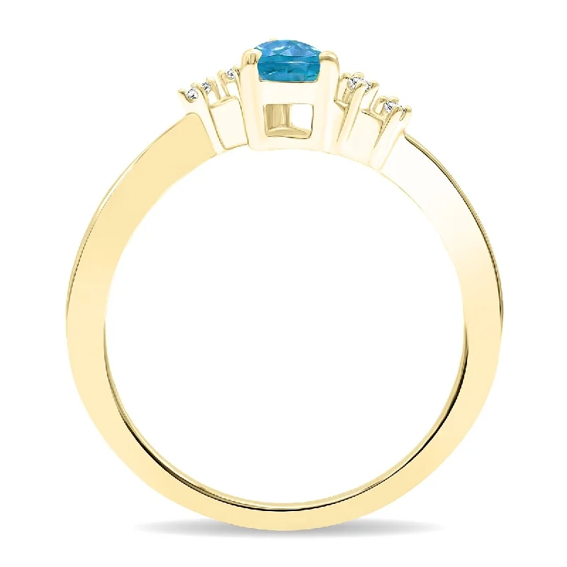 Women's Pear Shaped Blue Topaz and Diamond Wave Ring in 10K Yellow Gold