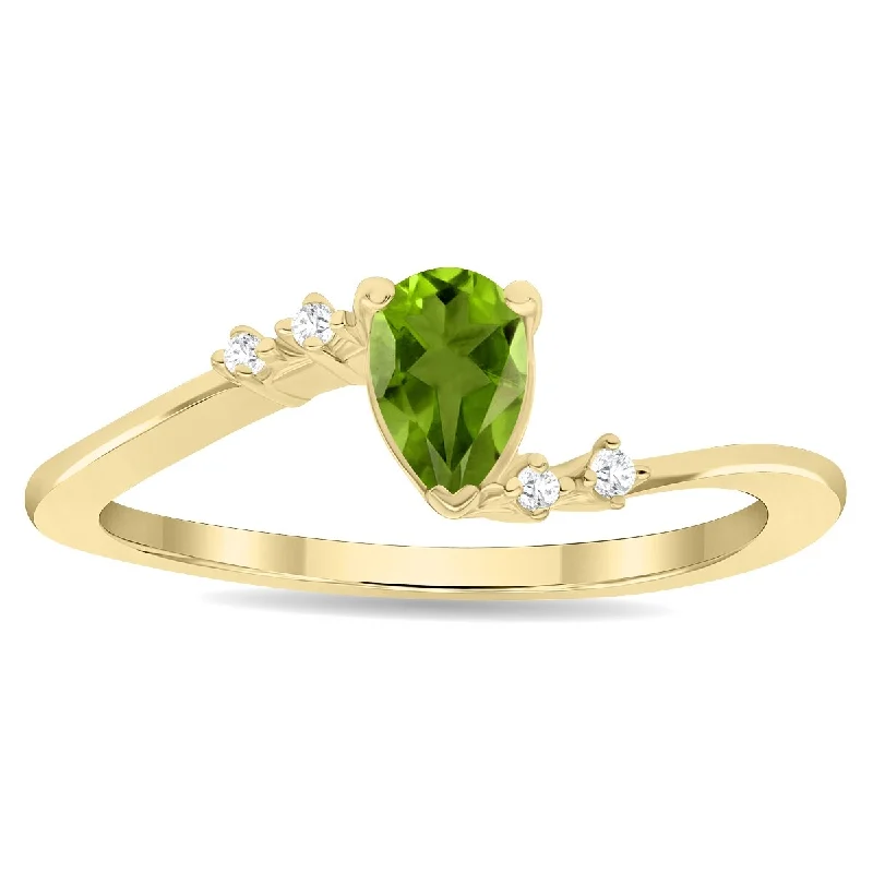 Women's Pear Shaped Peridot and Diamond Wave Ring in 10K Yellow Gold