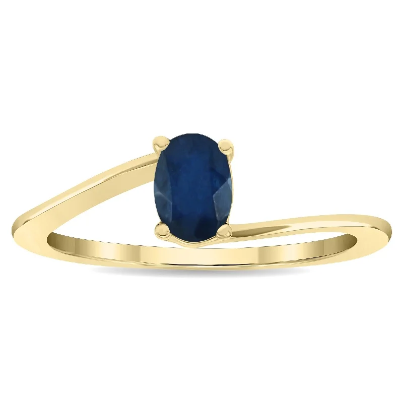 Women's Solitaire Oval Shaped Sapphire Wave Ring in 10K Yellow Gold